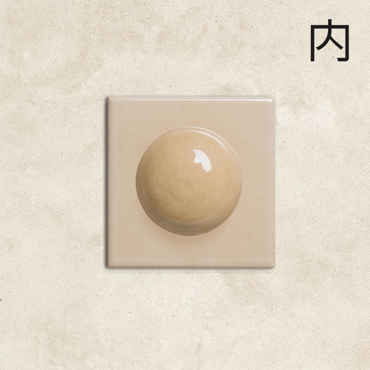 Sand Button Tile - Add subtle architectural sophistication and warm neutral texture to your walls with this 3D ceramic tile.