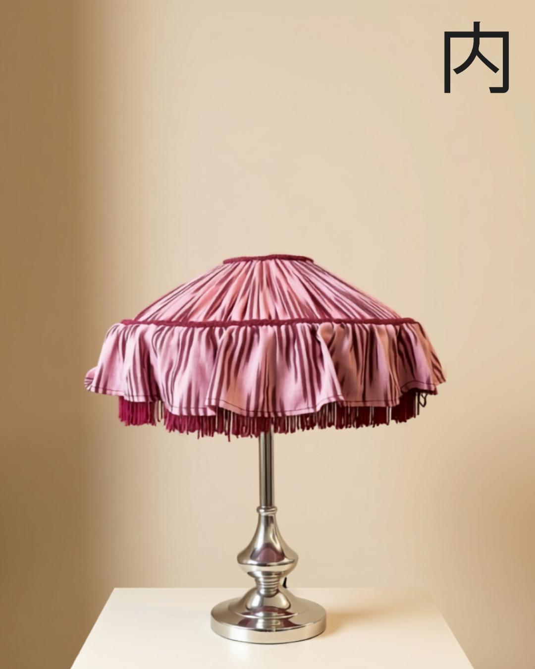 Crimson lampshade - two-tier gathered lampshade in a pink and burgundy ikat print, finished with a swingy fringe trim